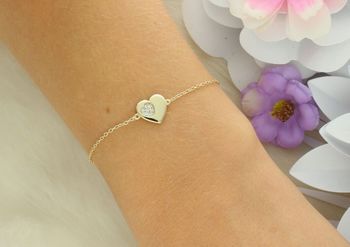 Oryginalna bransoletka Nomination Italy 242300 006 z kolekcji Petit Sparkle. Srebro 925, pozłacana 18K złotem, zdobiona cyrkoniami w kształcie serduszka. Regulowana długość 16–19 cm. Idealna na pr.jpg